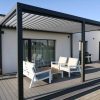 Juoda pavėsinė pergola terasoje