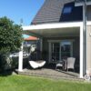 Bioklimatinė pergola su įstiklinimo sistema