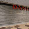 Pakeliamos apsauginės aliuminės grotos Danija parduotuvėje