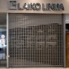 Pakeliamos apsauginės aliuminės grotos Laiko linijos parduotuvėje