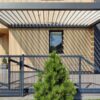 Pergola nuo saulės namo kieme