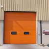 Oranžiniai pramoniniai garažo vartai