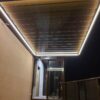 Prestige bioklimatinė tradicinė pergola namo terasoje su apšvietimu iš vidaus