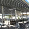 Didelė tradicinė pergola nuolaidžiu stogu su apšvietimu