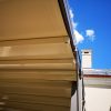 Tentinės pergolos kavinės kiemelyje stogas