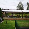 Tradicinės tentinės pergolos tvirtinimo prie žemės vieta